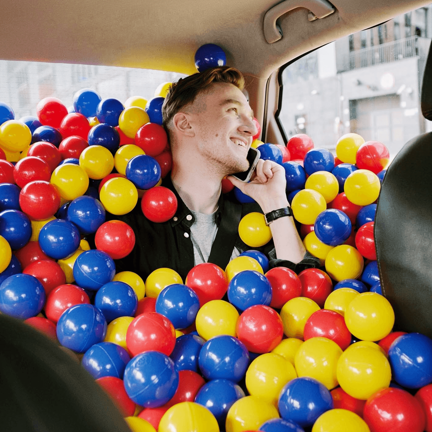 Official FLUX.2 car interior edit filled with colorful balls